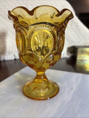 LE Smith amber glass compote in the Moon and Stars pattern - ruffled edge. MCM